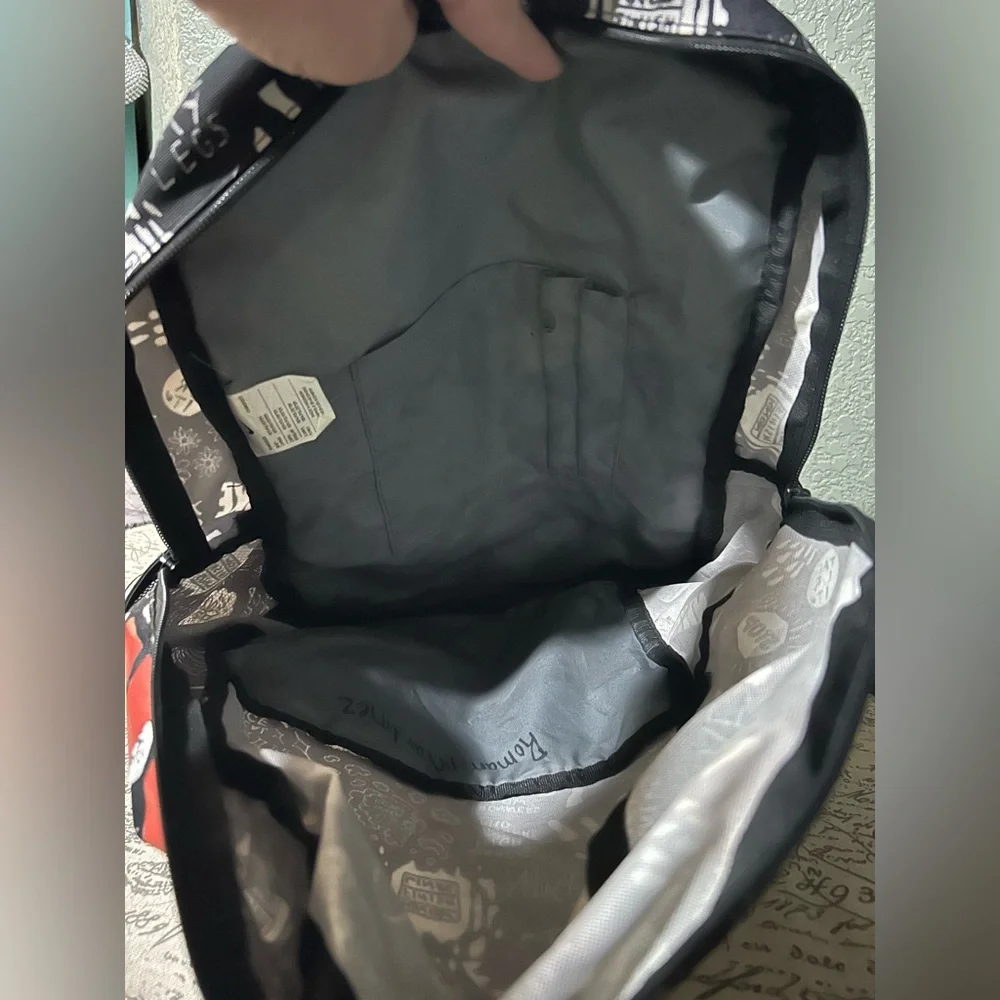 Nike Black Backpack with White Graphic and Red Accents